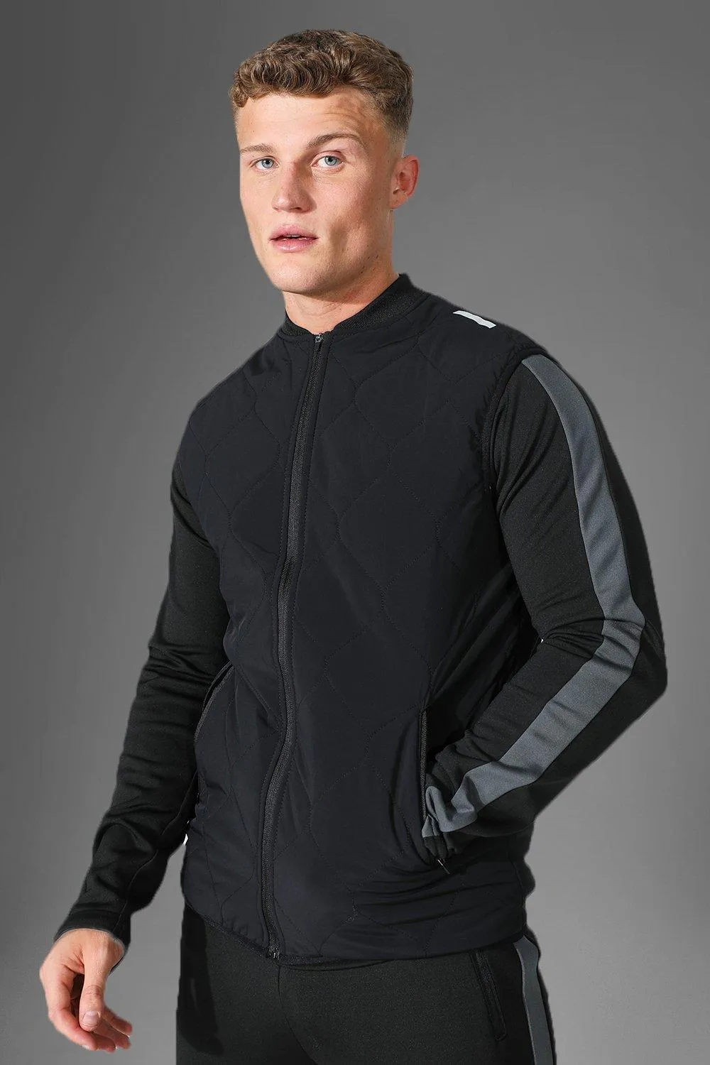 Man Active Gym Padded Quilted Body Warmer | boohooMAN UK