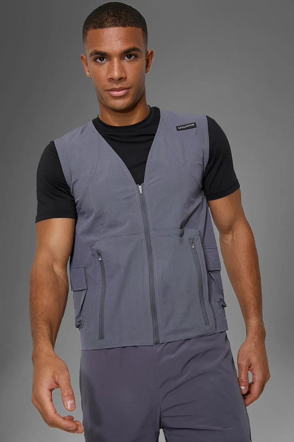 Man Active Gym Technical Utility Body Warmer | boohooMAN UK